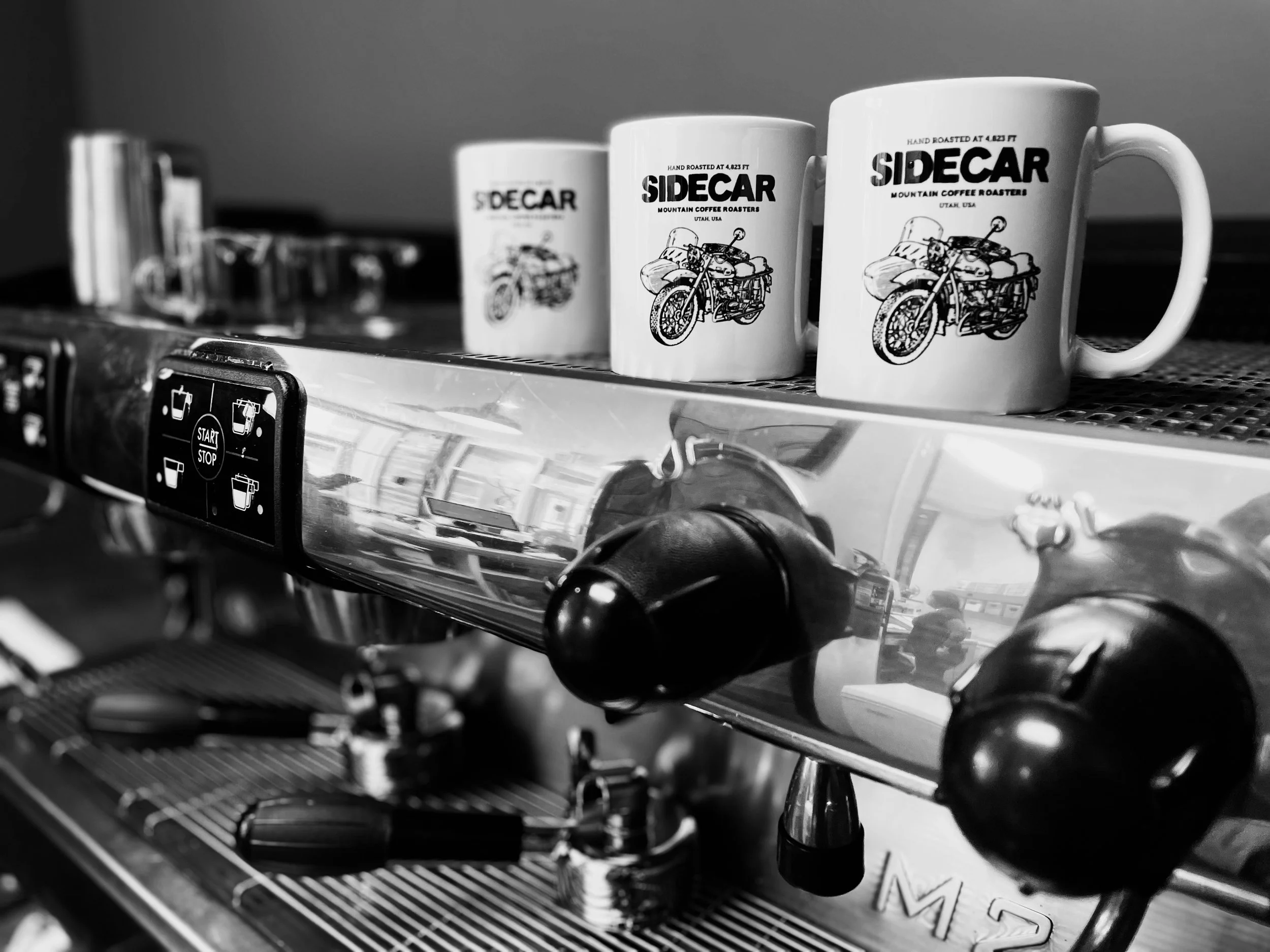 Sidecar coffee mugs on the espresso machine